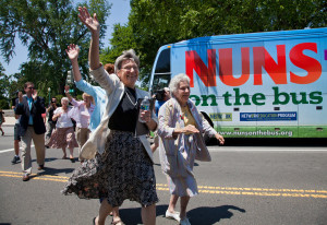 Sister Simone Campbell, left, and Sister Diane Donoghue, right, lead the way as the the "Nuns on the Bus" arrive on Capitol Hill in Washington, Monday, July 2, 2012, after a nine-state tour to bring stories of hardship to Congress. Sister Simone Campbell is executive director of Network, a liberal Catholic social justice lobby in Washington. (AP Photo/J. Scott Applewhite)